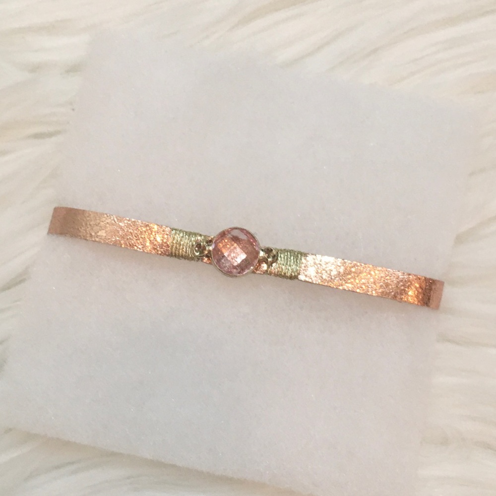 NEW Gold colored band bracelet with pink stone